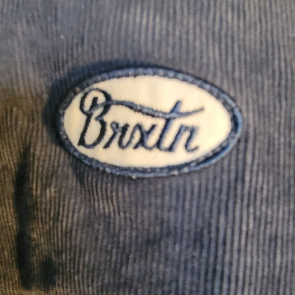 Brixton woman's large blue jacket